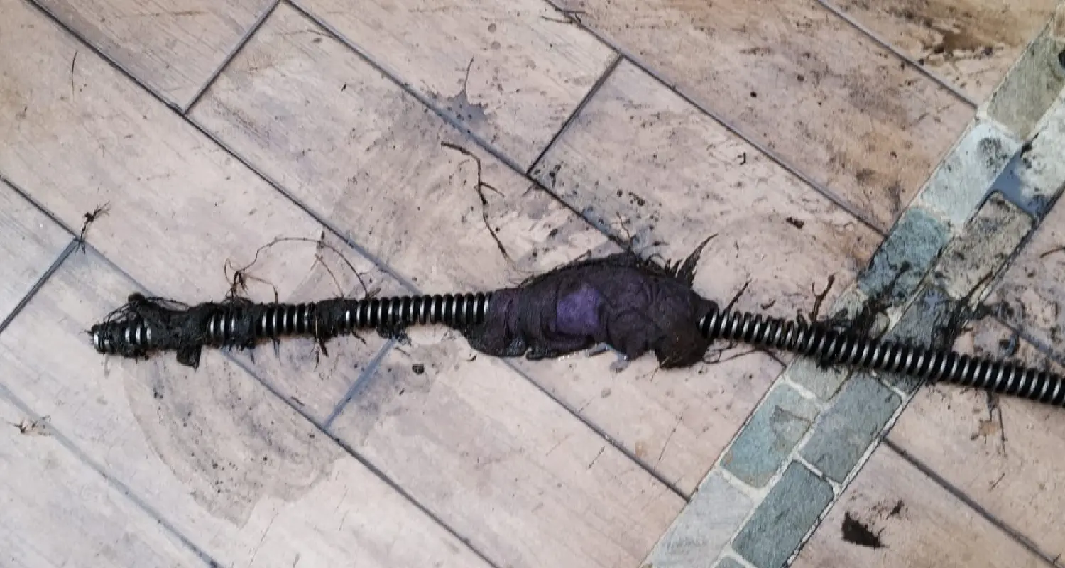 Rotosonda con un trapo enredado que provocaba el bloqueo en la tuberia de drenajes en ciudad de mexico coyoacan